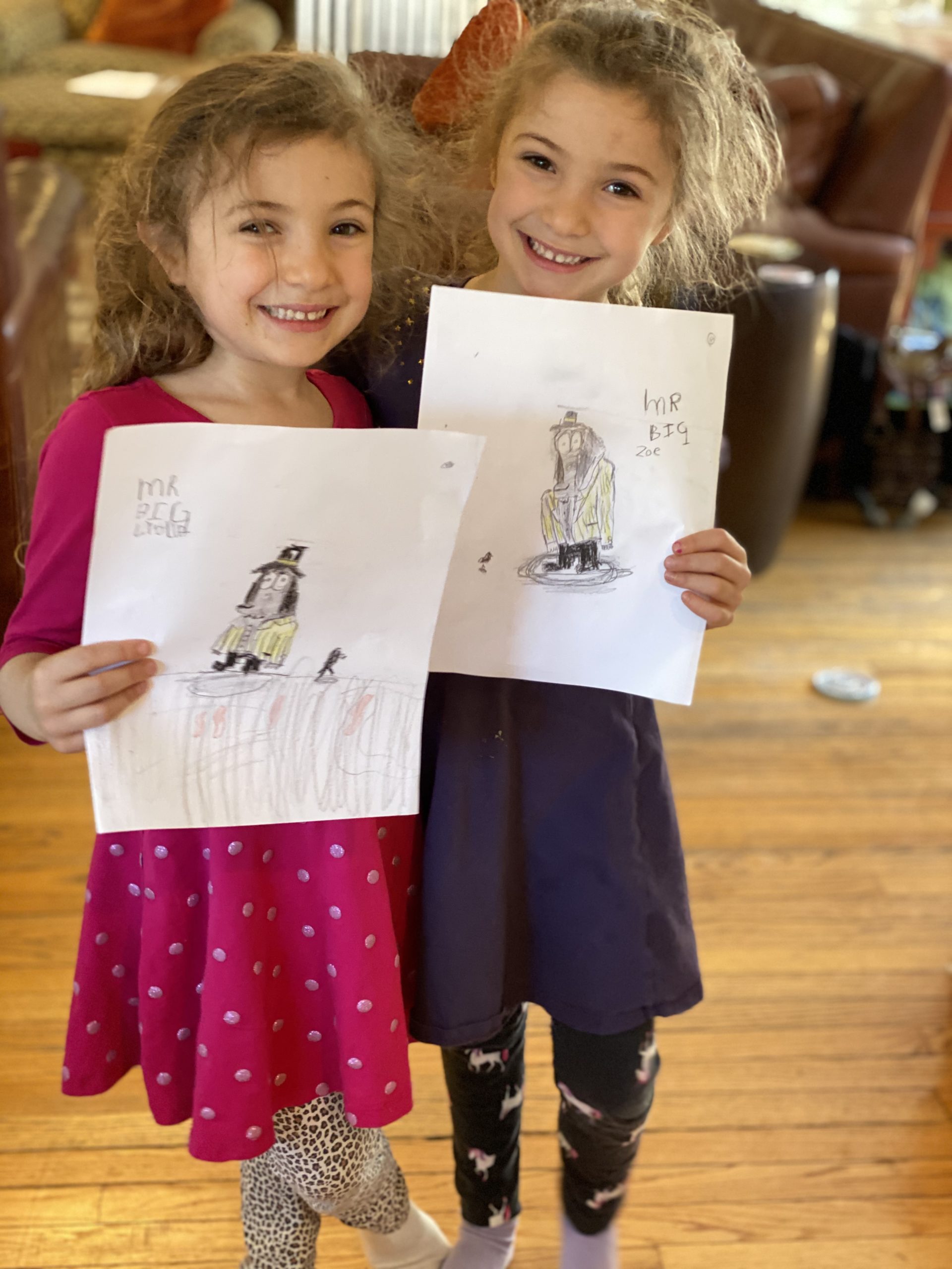 Lydia and Zoe with their Mr. Big Ed Vere drawings